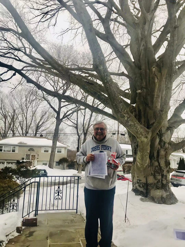 The elderly neighbor and his family's 300-year-old tree